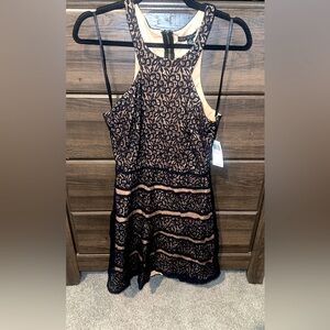 Never worn black and nude dress